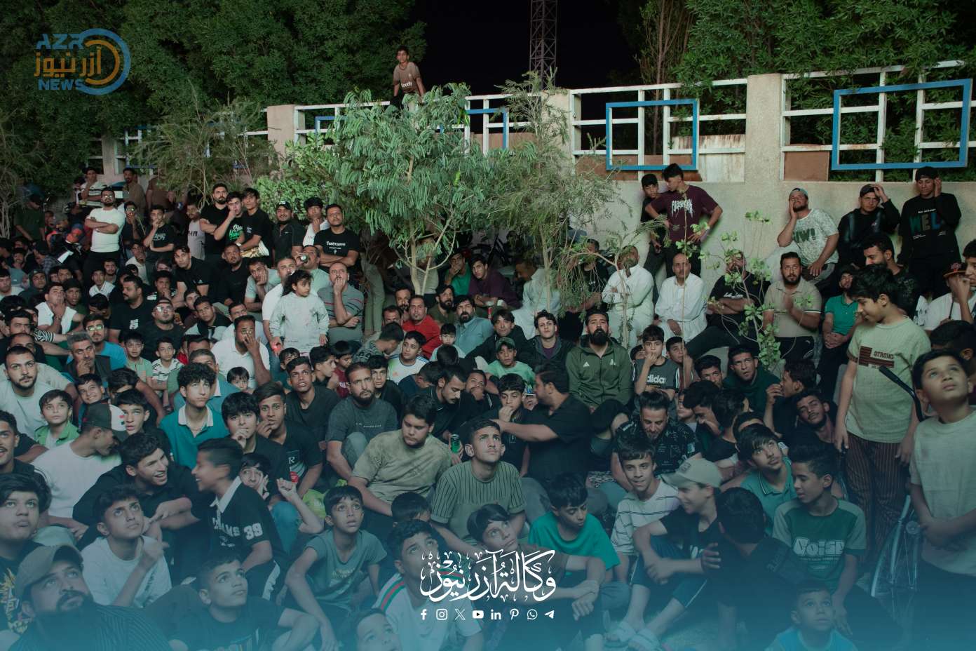 أهالي كربلاء يشجعون أسود الرافدين من قلب الحدائق العامة